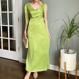 Long green wedding guest dress with tie straps and cowl neck